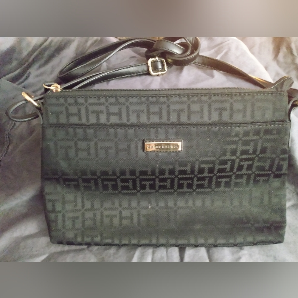 Tommy Hilfiger Black embroidered TH Logo pattern crossbody bag. 10x7x2 in inches